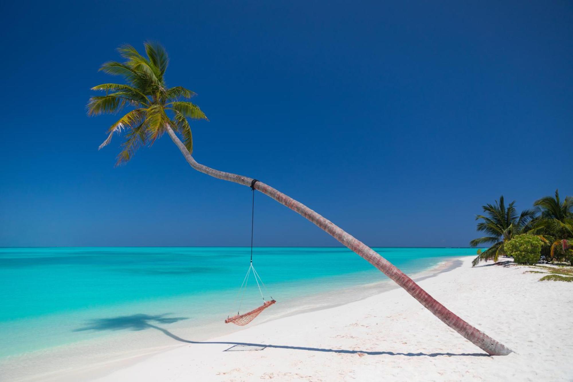 Meeru Maldives Resort Island Dhiffushi Esterno foto A beach in Maldives