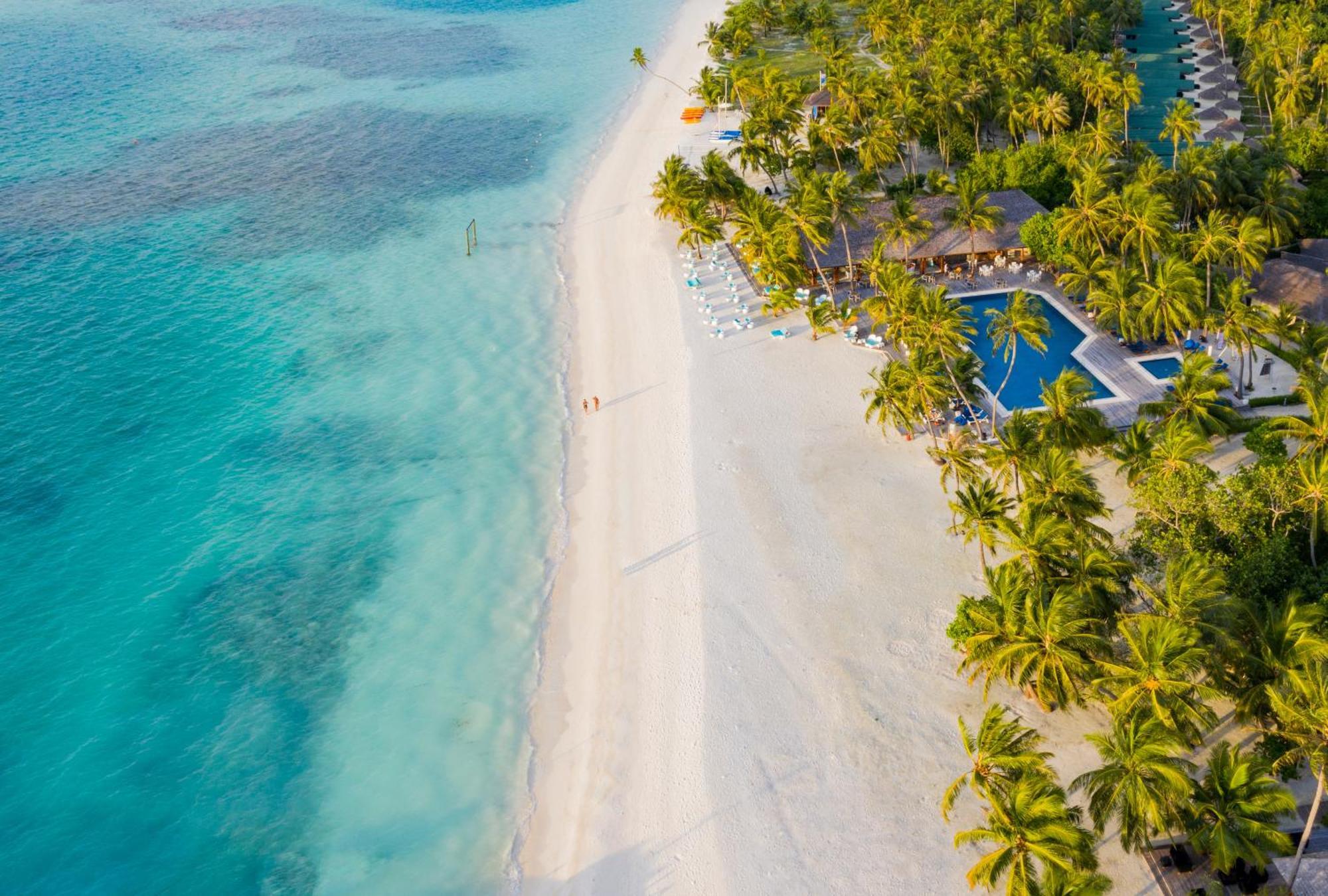 Meeru Maldives Resort Island Dhiffushi Esterno foto Aerial view of the beach