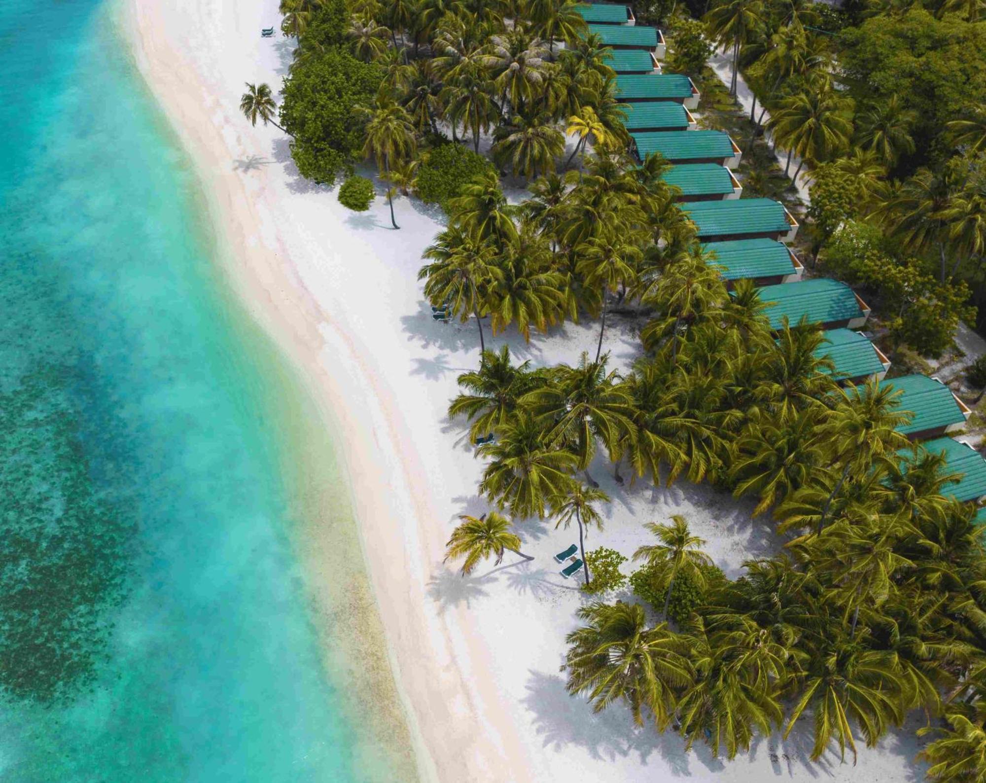 Meeru Maldives Resort Island Dhiffushi Esterno foto Aerial view of the beach