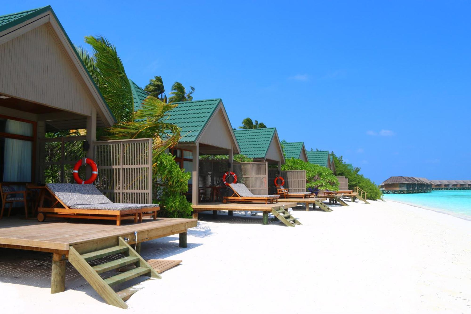 Meeru Maldives Resort Island Dhiffushi Camera foto Beach bungalows at the resort