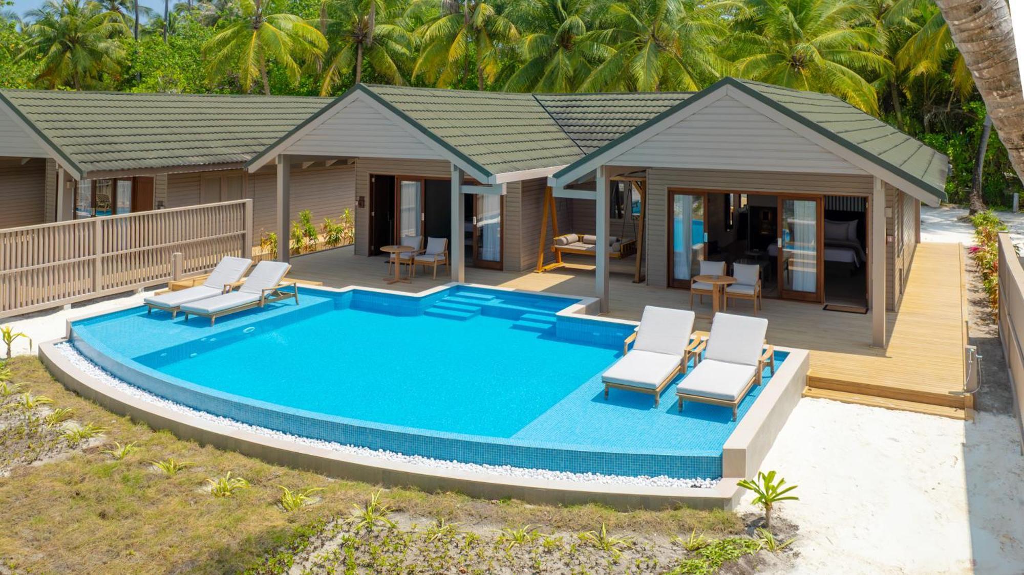 Meeru Maldives Resort Island Dhiffushi Esterno foto A pool villa at the resort
