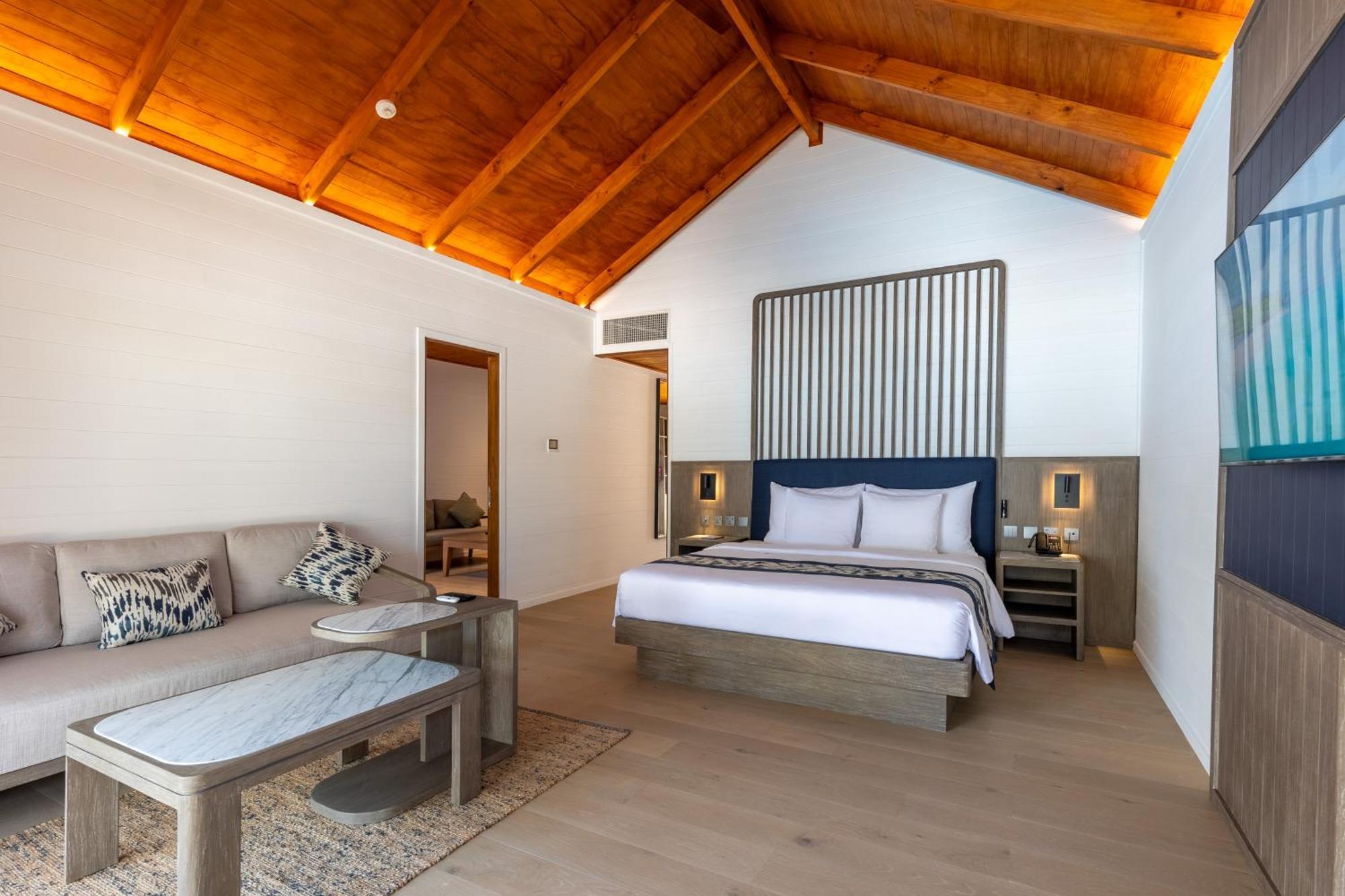 Meeru Maldives Resort Island Dhiffushi Camera foto A bedroom at the resort
