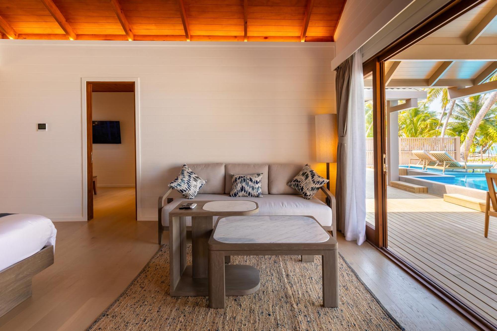 Meeru Maldives Resort Island Dhiffushi Camera foto A living room in a villa at the resort